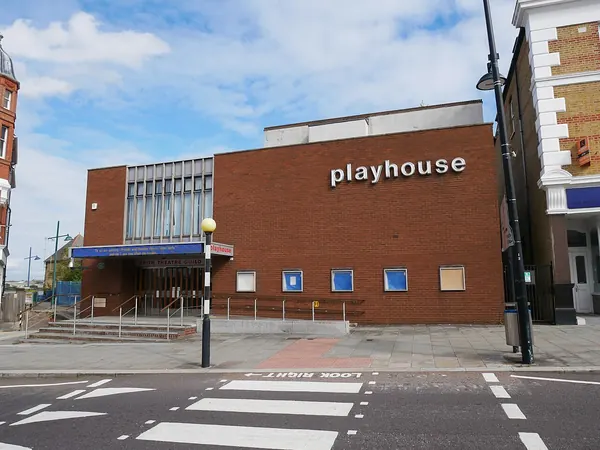 Brick frontage and 'playhouse' lettering of Erith Playhouse on the High Street