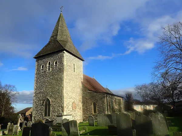 Flint tower and shingled spire of St Peter and St Paul Church, Swanscombe