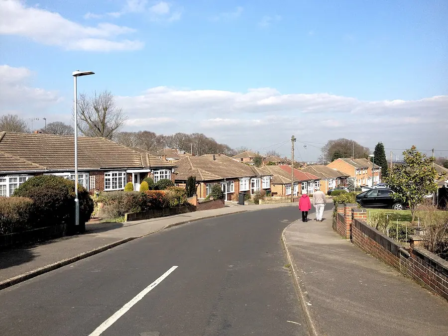 Row of bungalows with low tiled roofs along Fernheath Way, Joyden's Wood