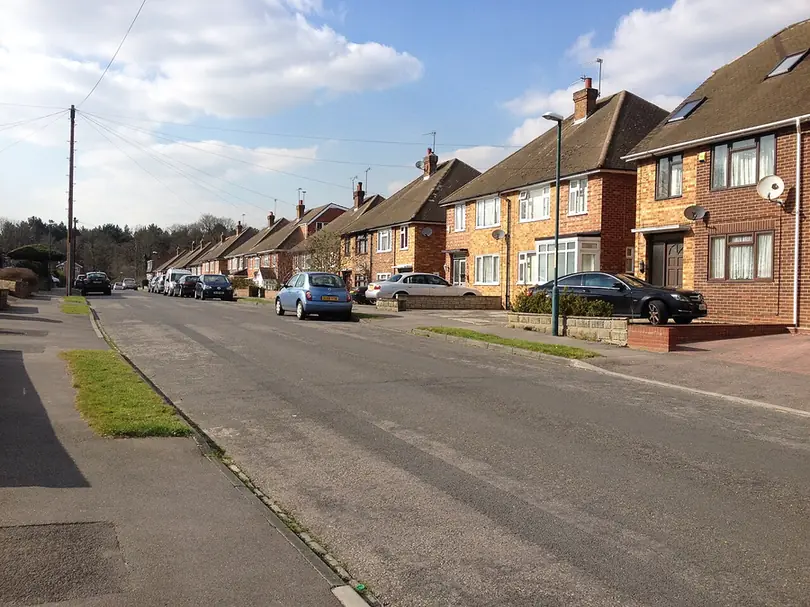 Street of semi-detached houses with tiled roofs and dormers on Eden Road, Joyden's Wood