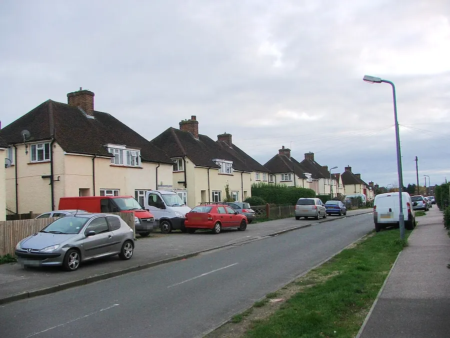 Post-war semi-detached houses with hipped tiled roofs along Lime Road, Swanley